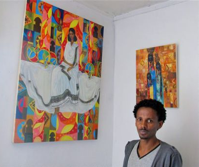 abiy-eshete-and-paintings.jpg